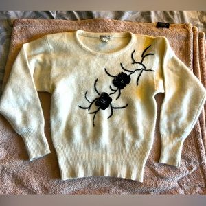 Christian Dior cream lake wool, angora, rabbit hair sweater with black flower.